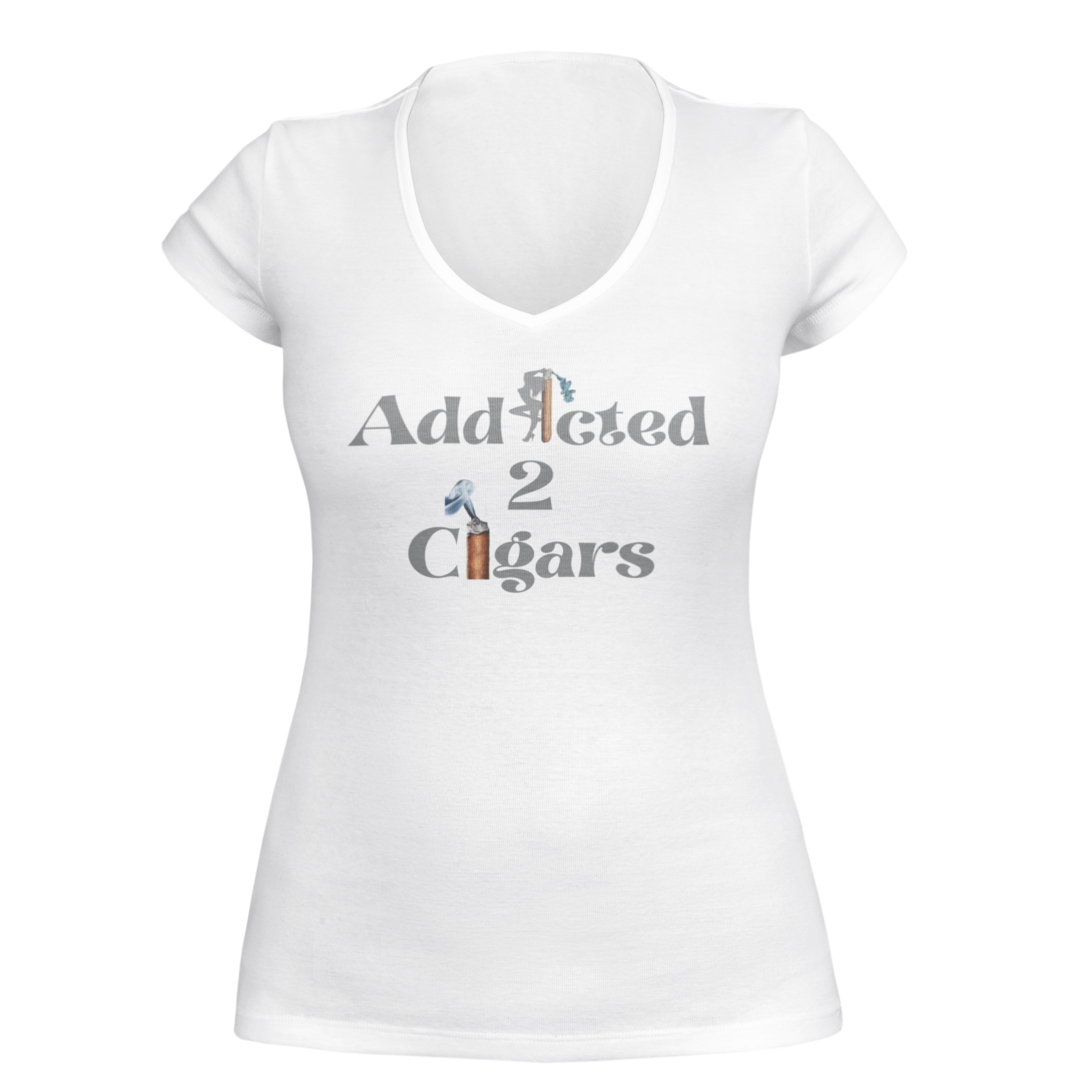 A gray women's V-neck T-shirt named "Addicted2Cigars Women Gray Short Sleeve" featuring the text "Addicted 2 Cigars" written across the front. The word "Addicted" has a cigar forming the letter "i," and a lit cigar creating the number "2," accompanied by smoke illustrations, perfect for those who appreciate a good cigar.