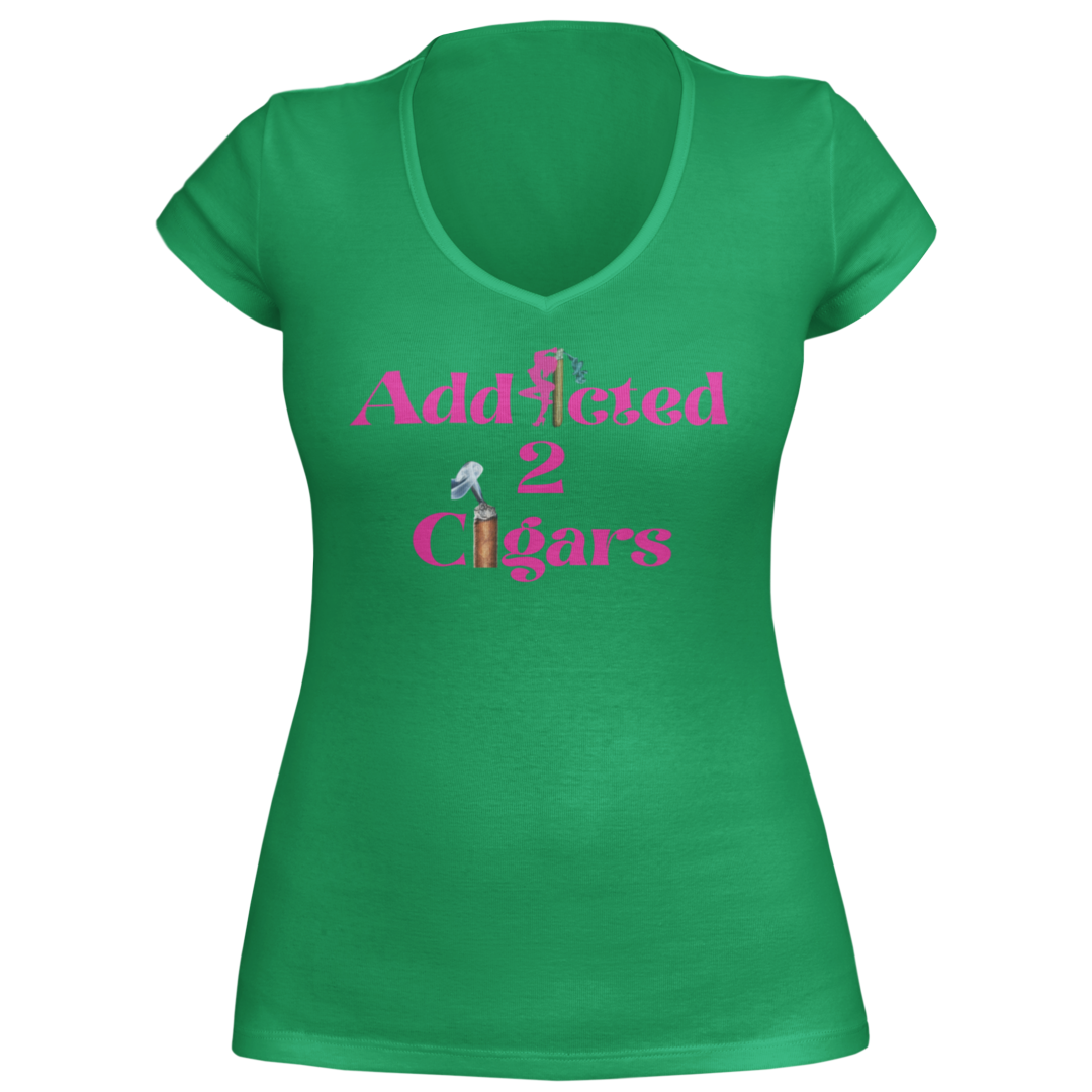 The Addicted2Cigars Women Pink Short Sleeve T-shirt features a V-neck design with "Addicted 2 Cigars" text in pink and white lettering. The word "Cigars" incorporates an image of a cigar, highlighting your passion for the hobby.